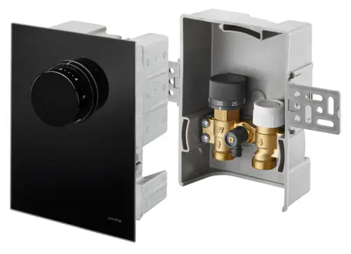 Temperaturregelungseinheit mit schwarzem Glasfrontpanel von Oventrop, eingebaut in graue Kunststoffdose. Sichtbare Regelungselemente und hydraulische Komponenten.